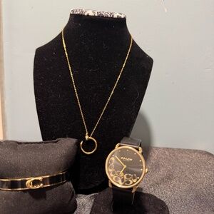 Stunning Coach 3-piece matching set in black and gold